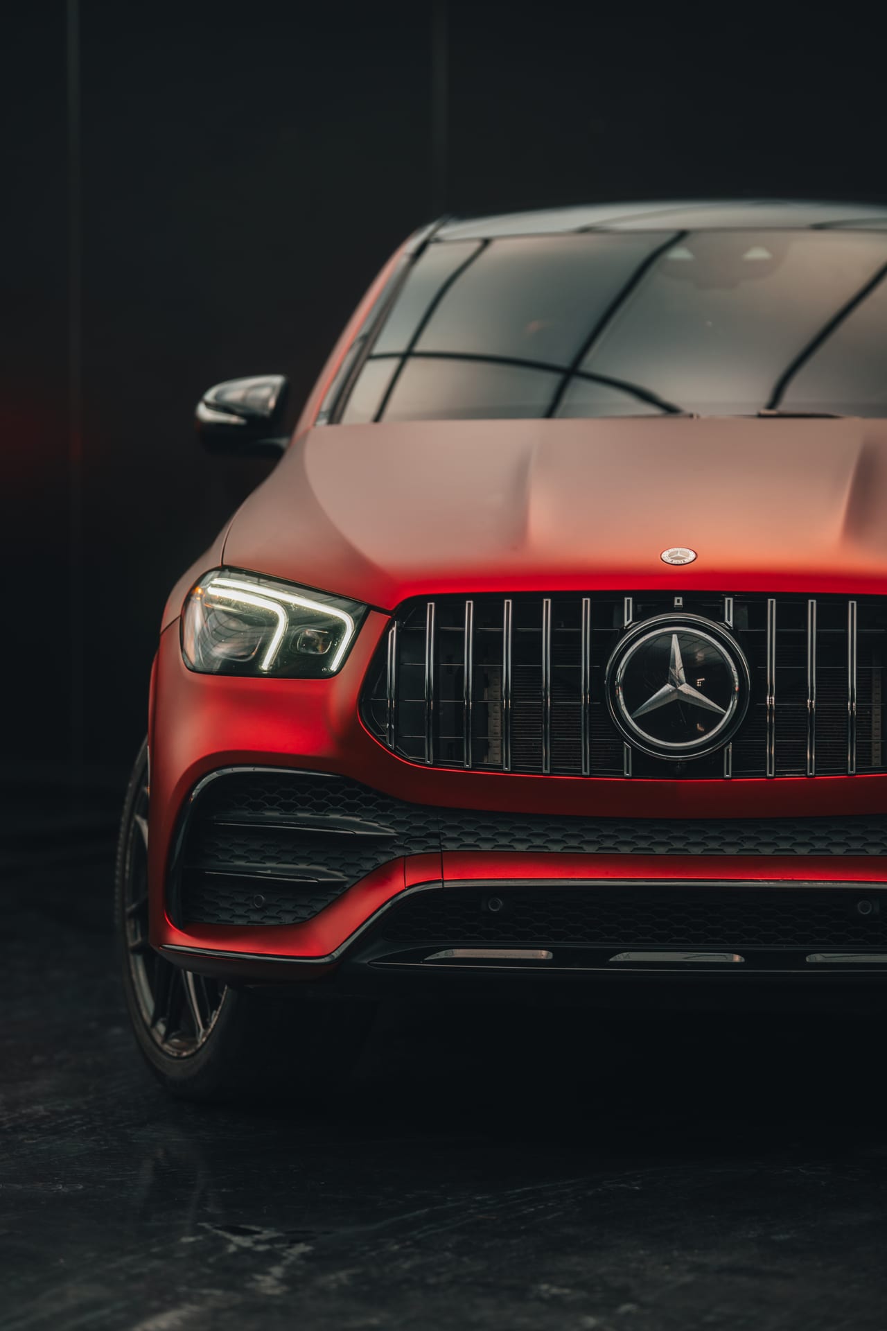 Premium vehicle front three-quarter shot in studio